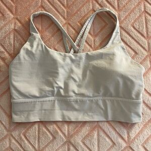 White/ Stone colored Lululemon Energy Longline sports bra